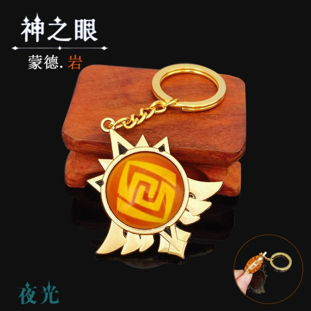 Game Genshin Impact Vision Lnazuma Ganyu Keqing Wendi Xiao Keychain Luminous 7 Element Weapons Eye Of Original God Toy KeyRing